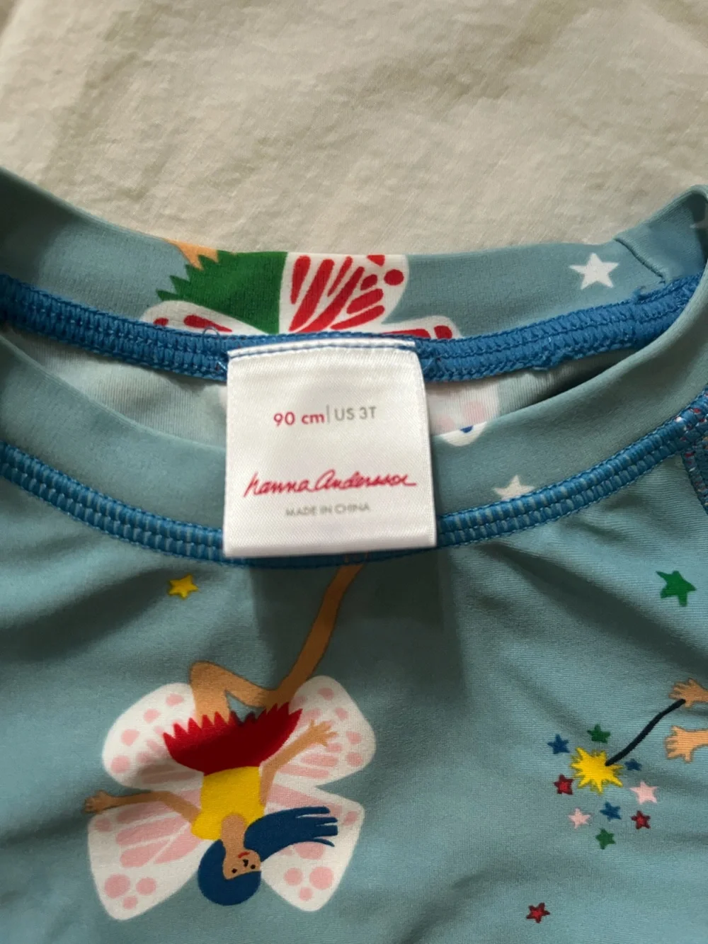 Hanna Andersson Aqua Swim Top with Multicolor Fairy Print